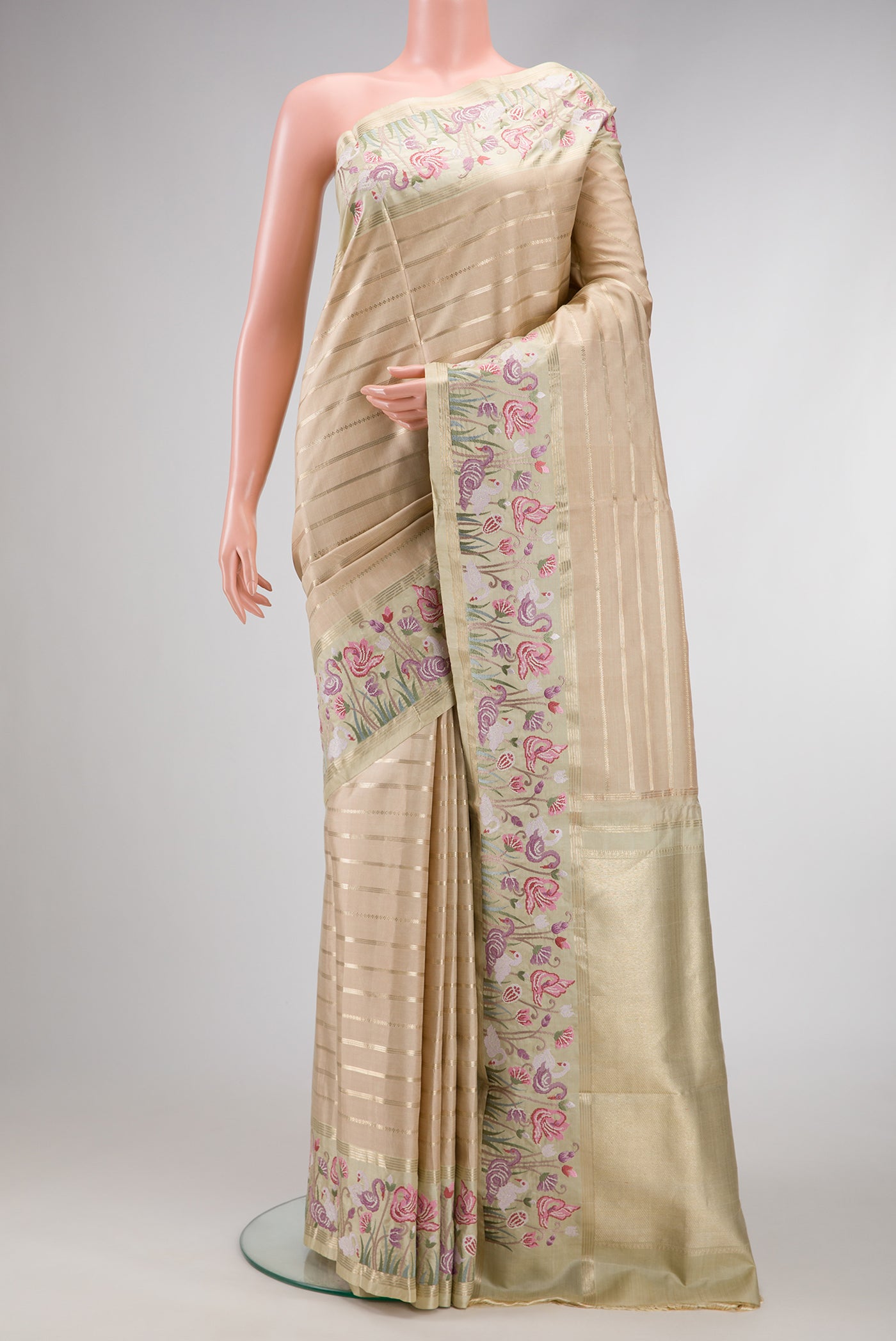 Pure Silk Pure Zari Green, Maroon & Burgundy Dual Tone Banarasi Saree with Stripes on the body and Embroidery Border.  displayed on a mannequin