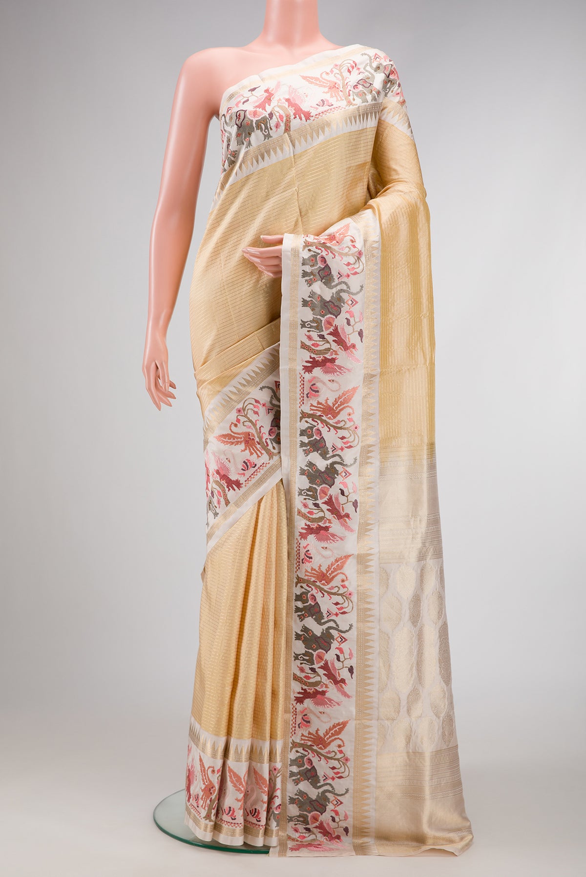 Sandal Dual Tone Banarasi Silk Saree with Stripes on the body and Embroidery Border.  displayed on a mannequin