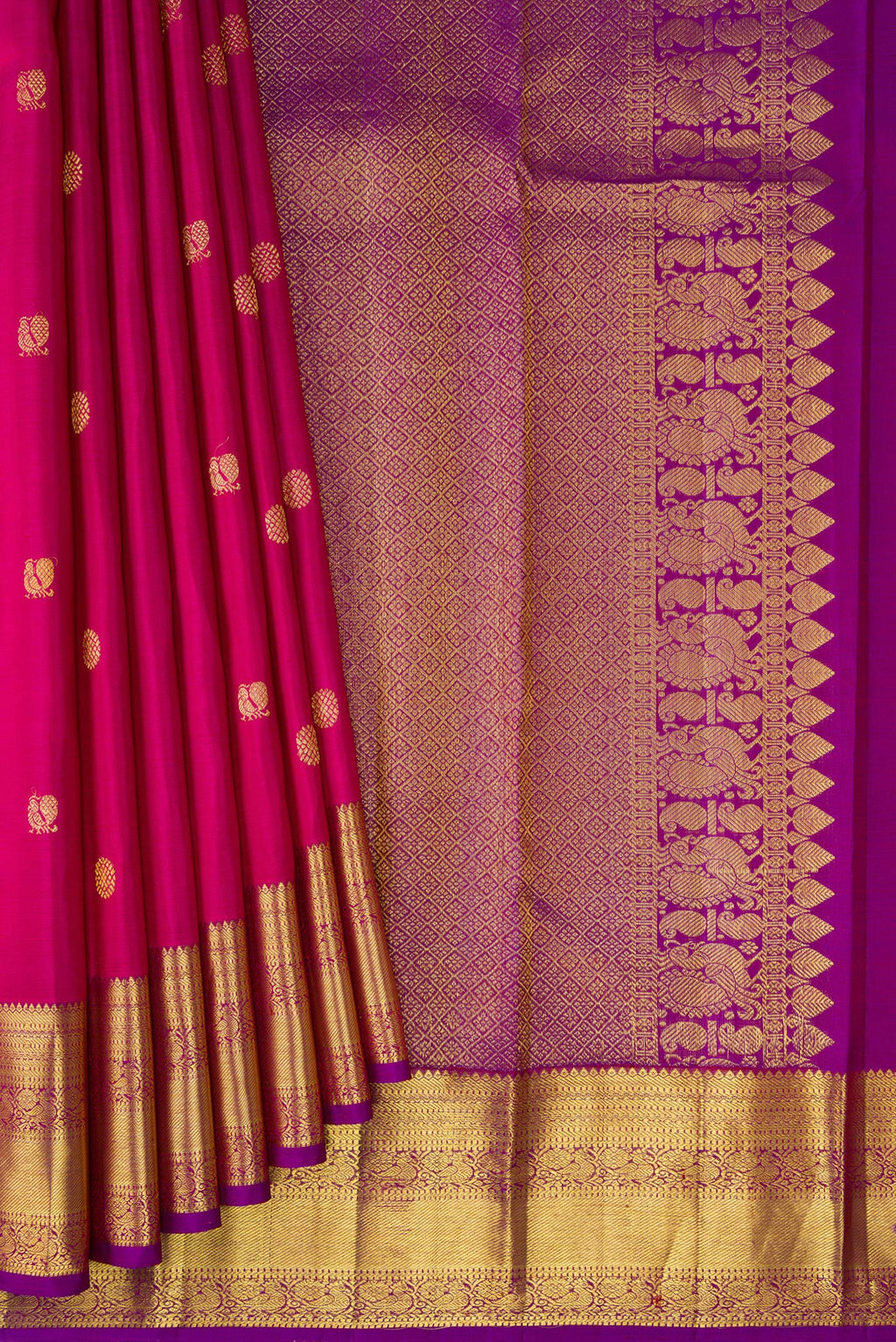 Pleats and pallu of Pink Kanjivaram Silk Saree with Zari Butta on the body and Zari Border. 