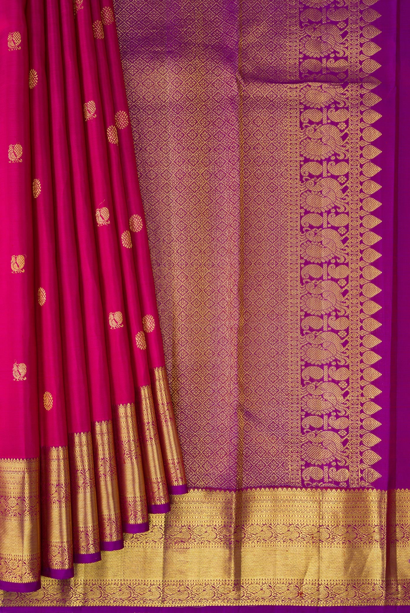 Pleats and pallu of Pink Kanjivaram Silk Saree with Zari Butta on the body and Zari Border. 