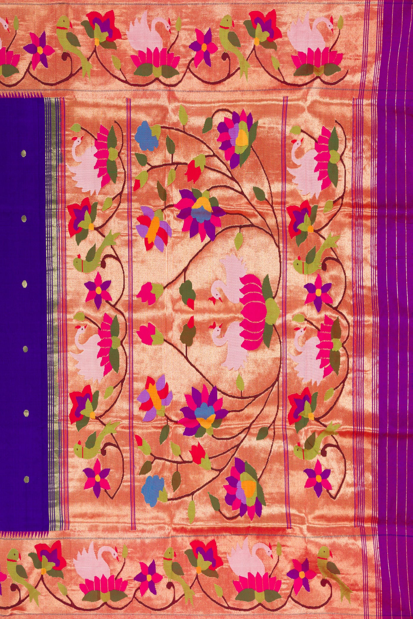 Close up image of the pallu of Royal Blue Paithani Silk Saree with Zari Butta on the body and Paithani Border. 