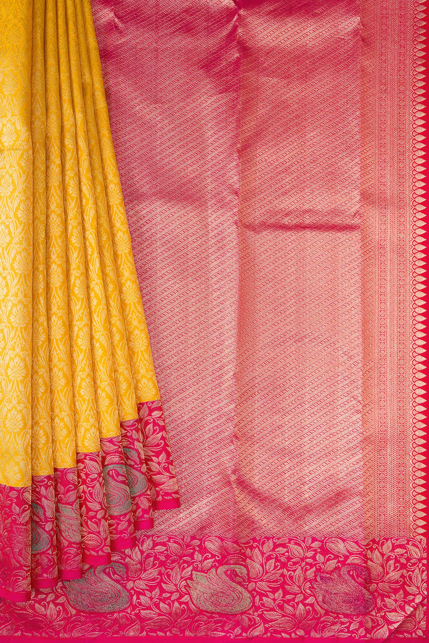 Pleats and pallu of Mustard Dual Tone Kanchipuram Silk Saree with Zari Brocade on the body and Zari Border. 