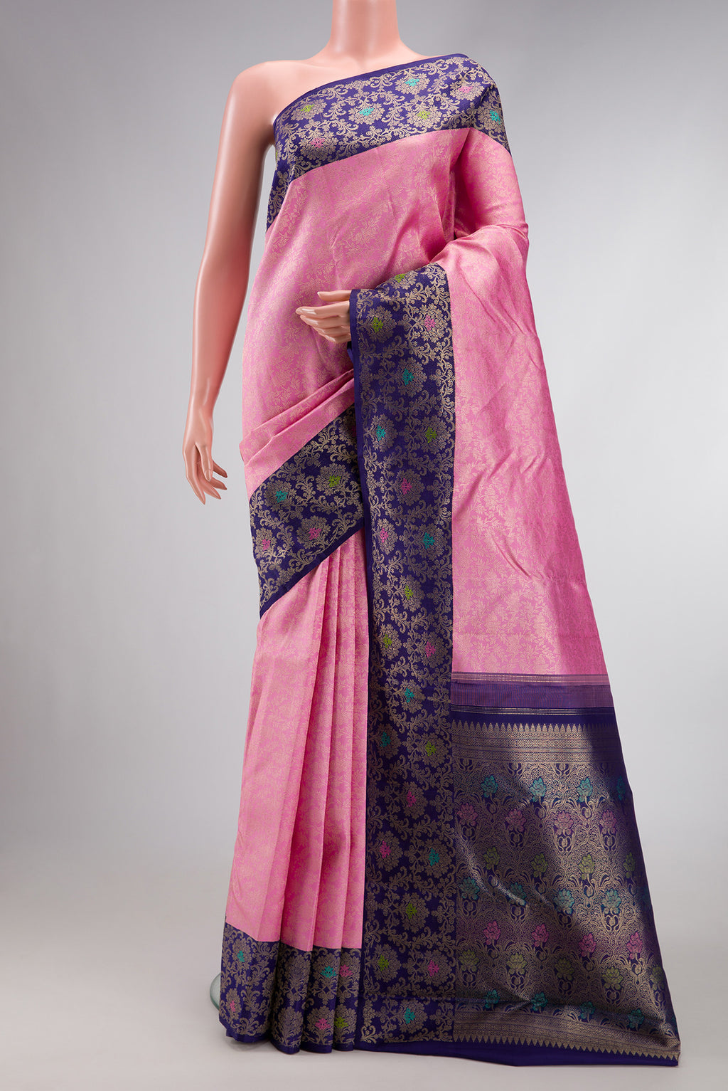 Pink Dual Tone Kanchipuram Silk Saree with Zari Brocade on the body and Zari Border.  displayed on a mannequin