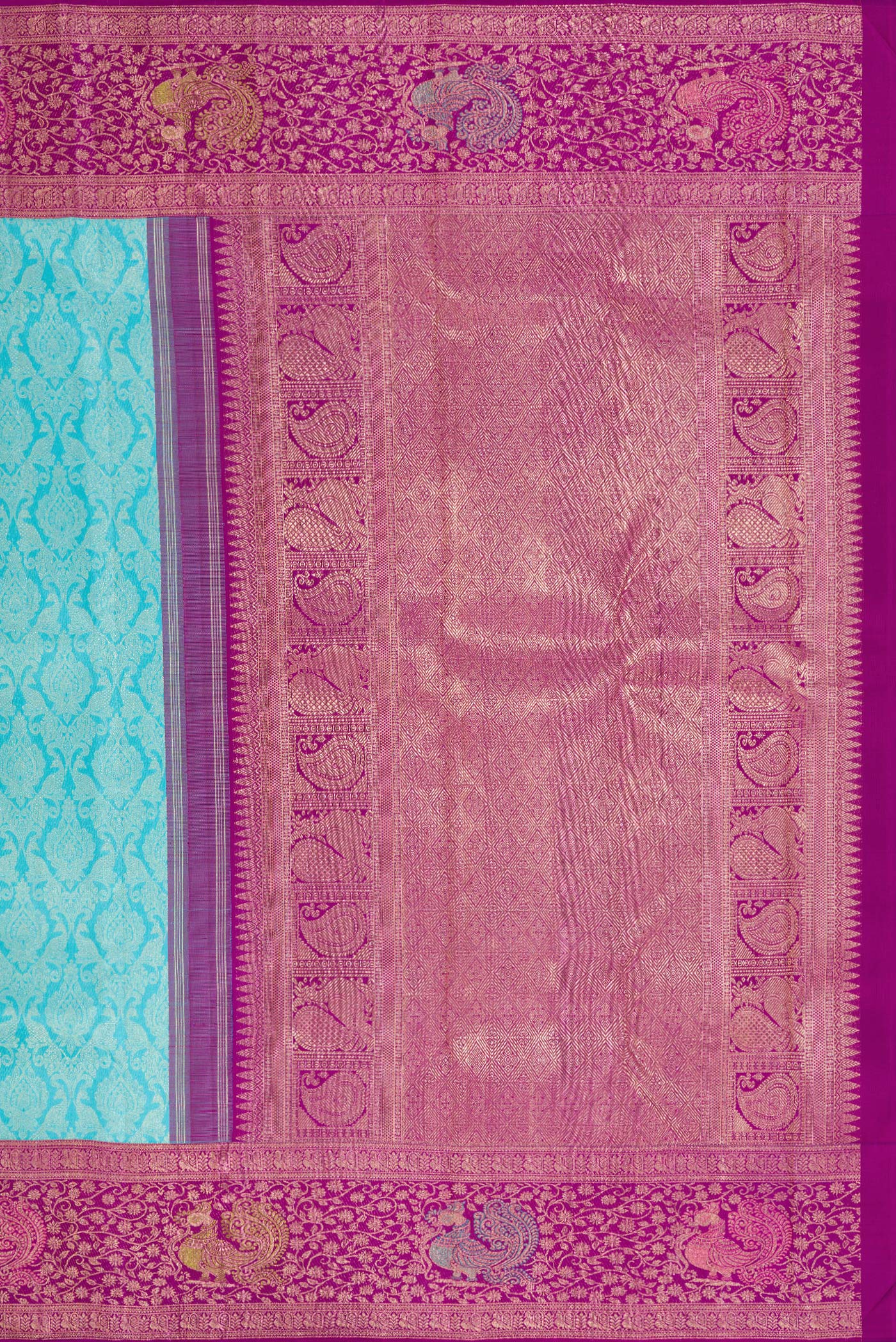 Close up image of the pallu of Sky Blue Dual Tone Kanchipuram Silk Saree with Zari Brocade on the body and Fancy Border. 