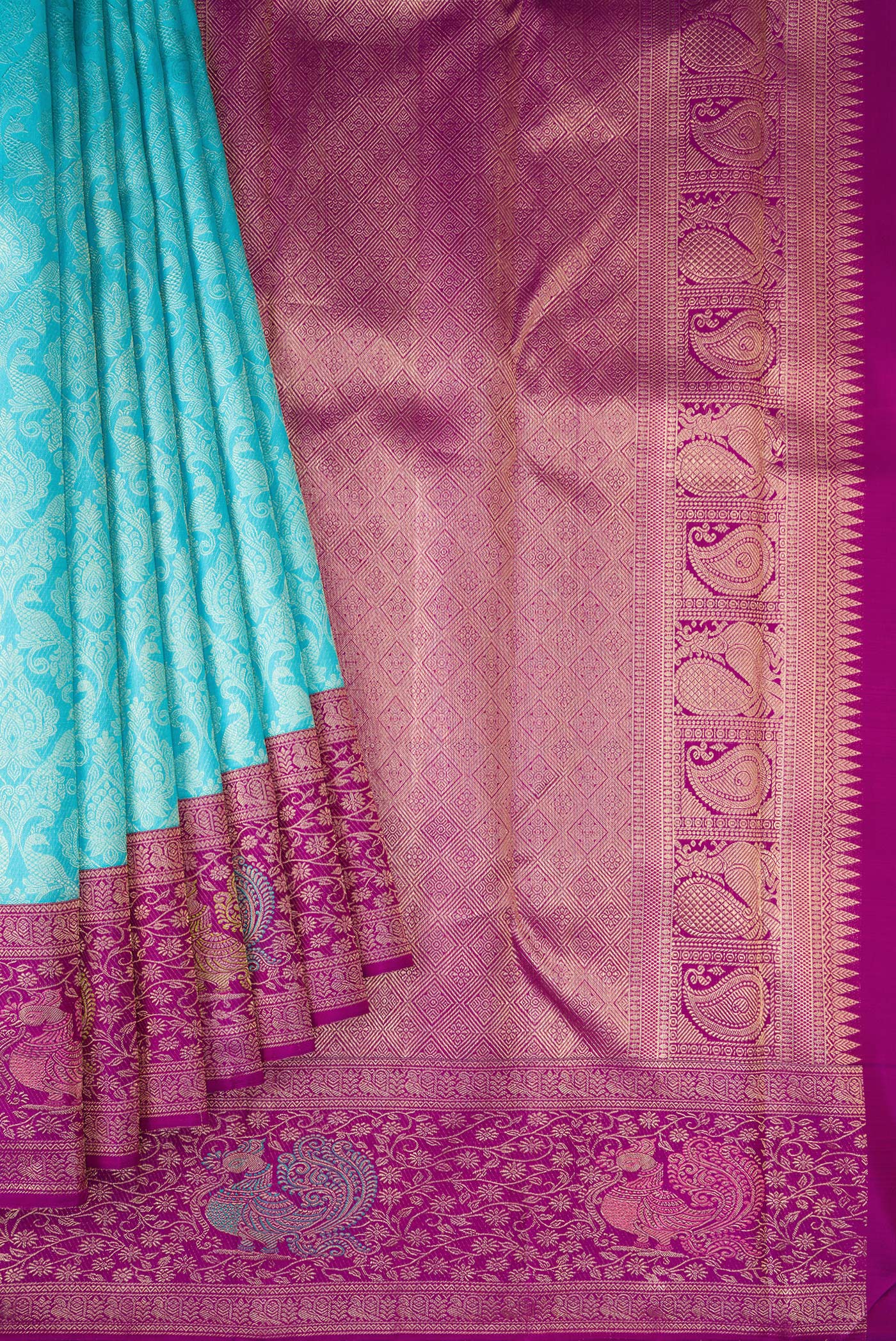 Pleats and pallu of Sky Blue Dual Tone Kanchipuram Silk Saree with Zari Brocade on the body and Fancy Border. 