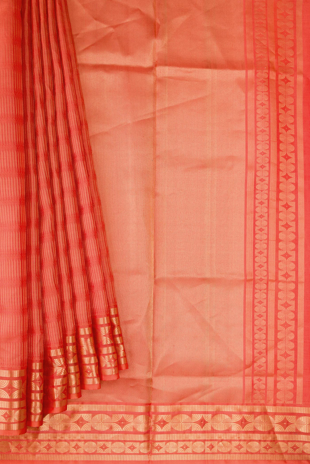 Pleats and pallu of Golden Peach Dual Tone Soft Silk Saree with Zari Brocade on the body and Zari Border. 