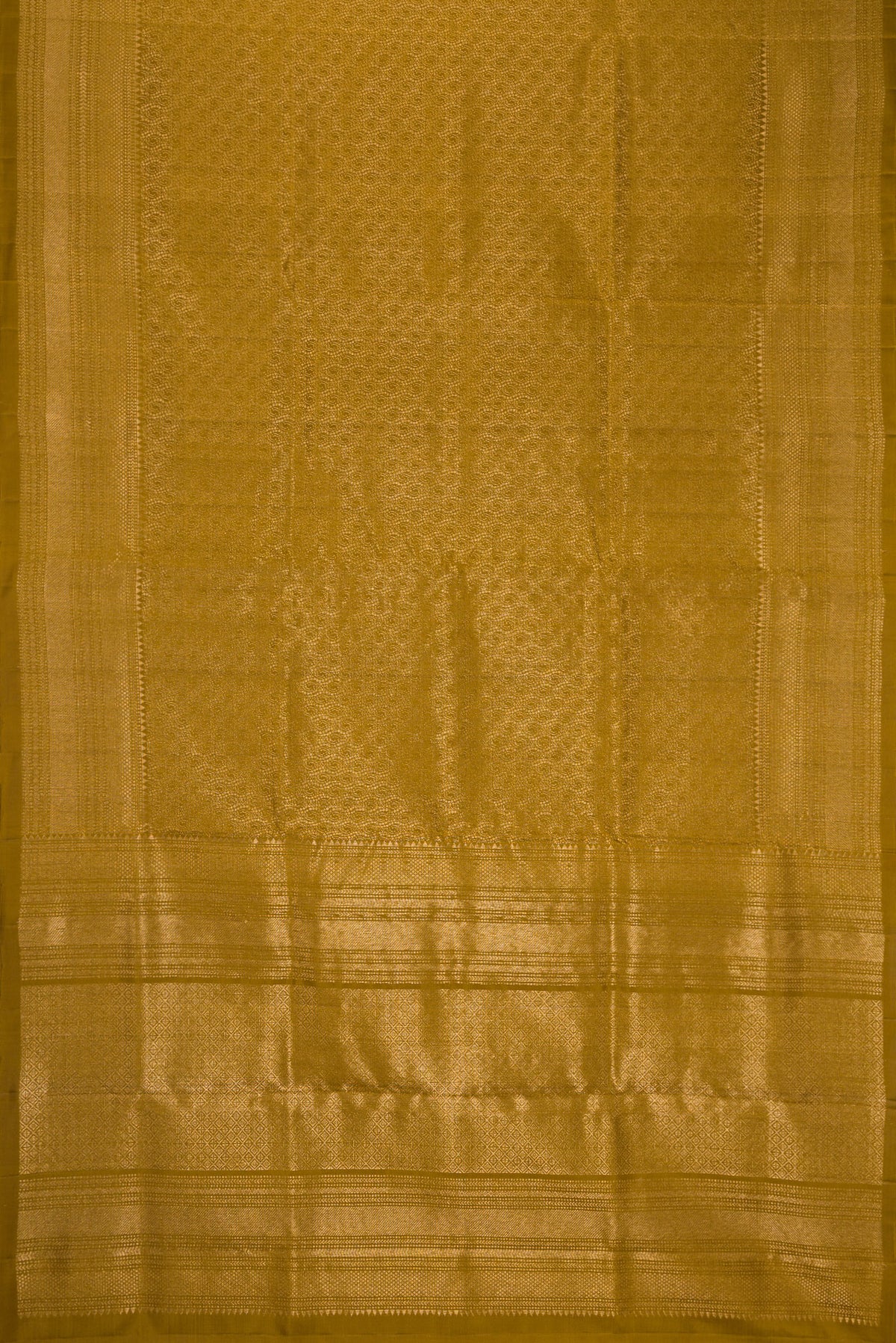 Flat view of Mehandi Green Dual Tone Soft Silk Saree with Zari Brocade on the body and Zari Border. 