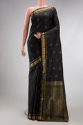 Black Dual Tone Soft Silk Saree with Zari Butta on the body and Zari Border.  displayed on a mannequin