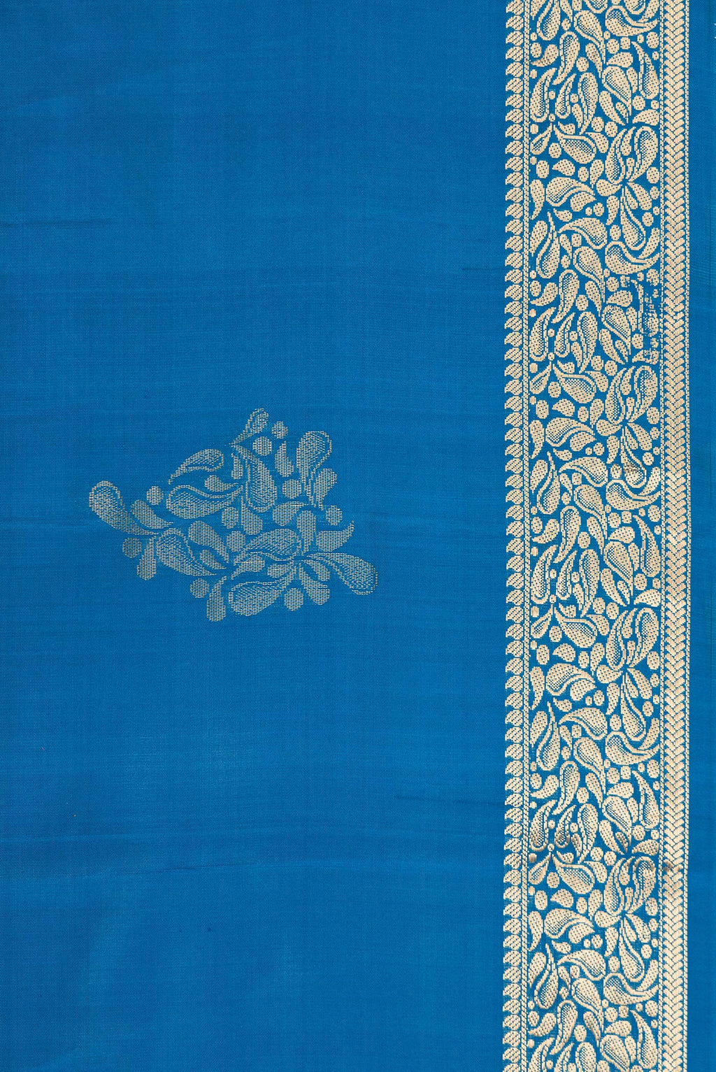 Border image of Peacock Blue Dual Tone Soft Silk Saree with Zari Butta on the body and Zari Border. 