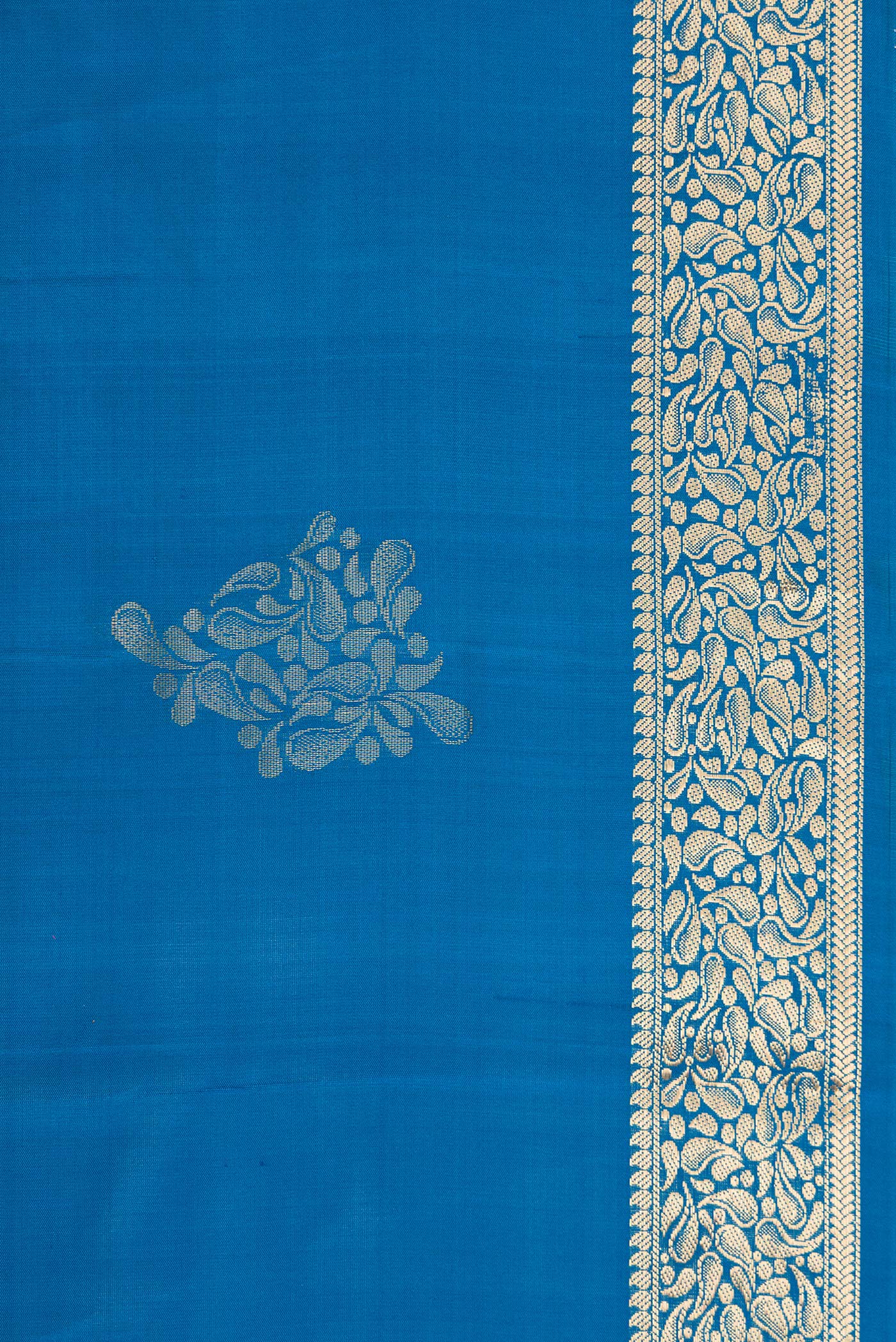 Border image of Peacock Blue Dual Tone Soft Silk Saree with Zari Butta on the body and Zari Border. 