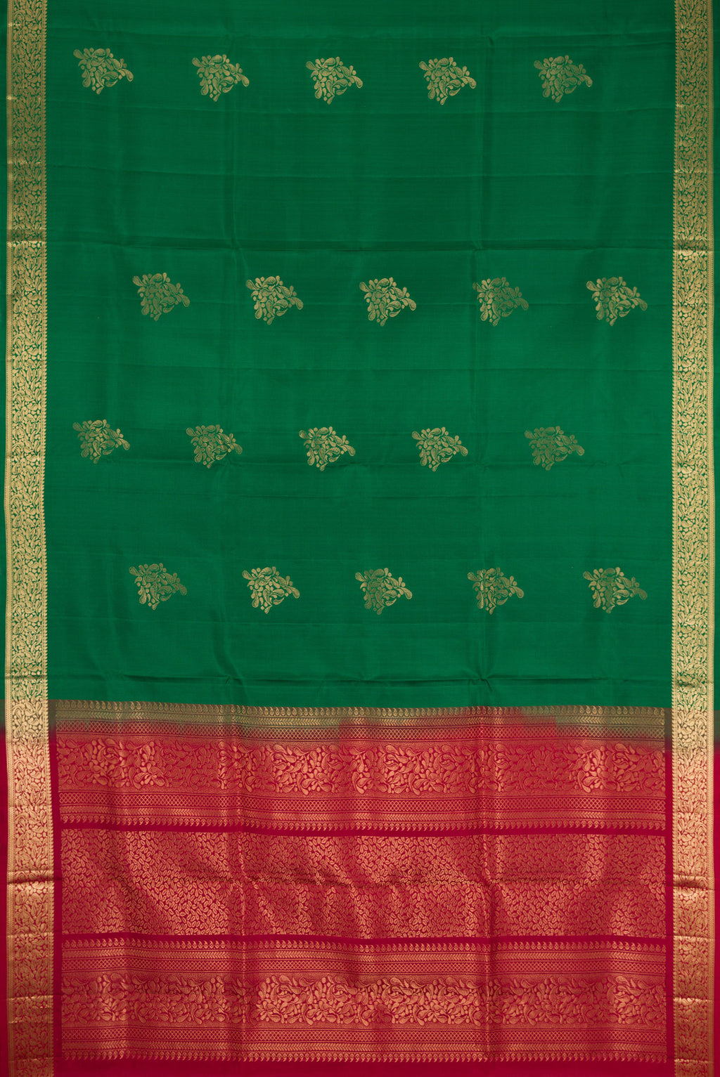 Flat view of Bottle Green Dual Tone Soft Silk Saree with Zari Butta on the body and Zari Border. 