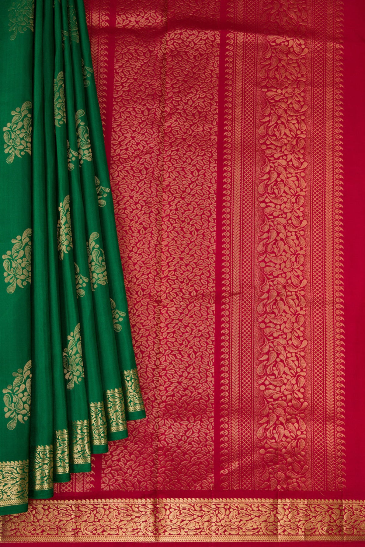 Pleats and pallu of Bottle Green Dual Tone Soft Silk Saree with Zari Butta on the body and Zari Border. 