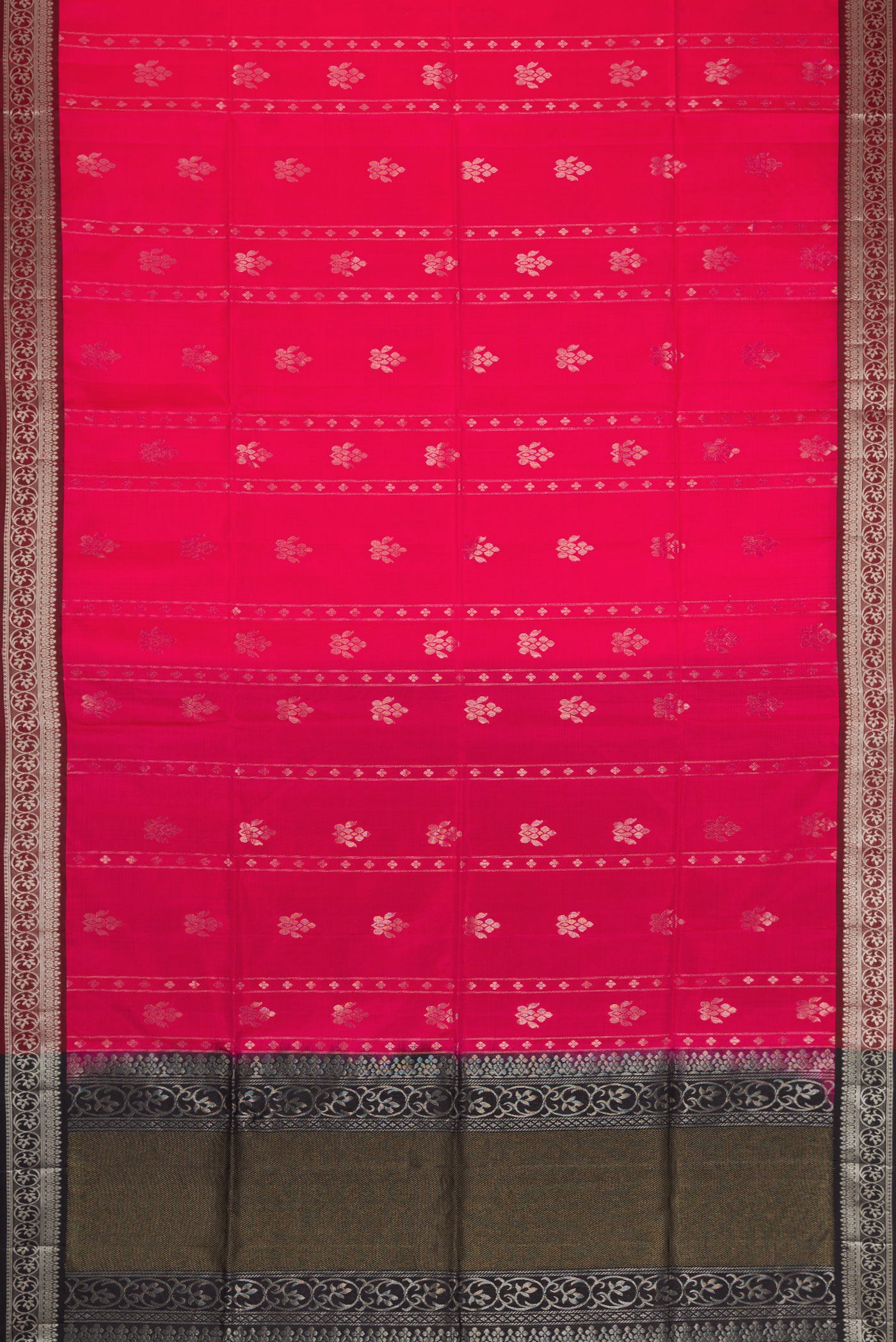 Flat view of Pink Soft Silk Saree with Zari Butta on the body and Zari Border. 