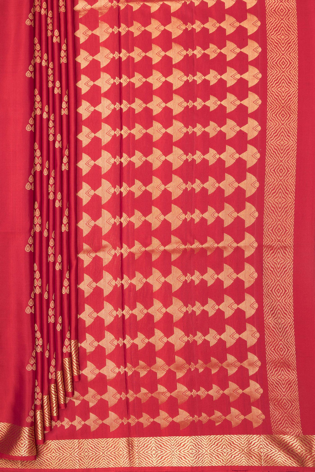 Pleats and pallu of Pure Silk Red Soft Saree with Zari Butta on the body and Zari Border. 