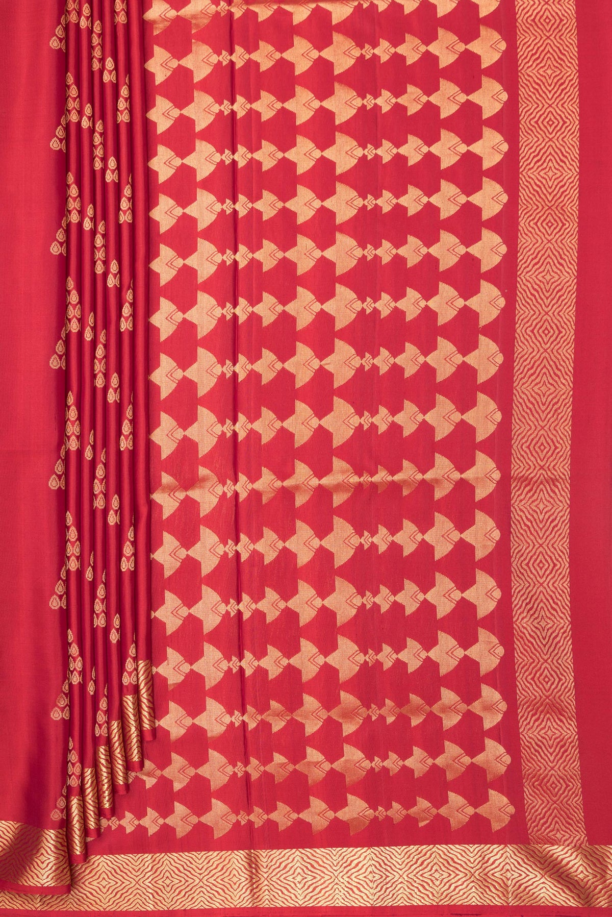 Pleats and pallu of Pure Silk Red Soft Saree with Zari Butta on the body and Zari Border. 