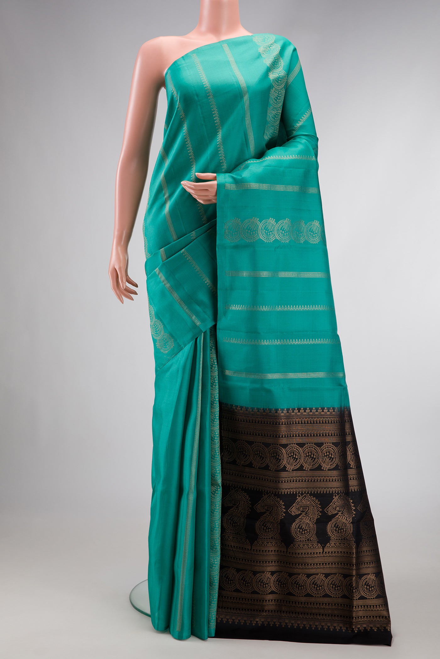 Sea Green Dual Tone Soft Silk Saree with Stripes on the body and Without Border.  displayed on a mannequin