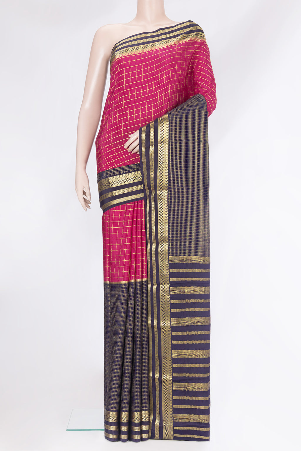 Multi Color Mysore Silk Saree with Checked design on the body and Zari Border.  displayed on a mannequin