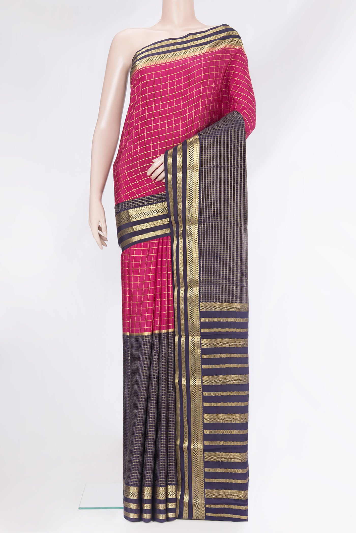 Multi Color Mysore Silk Saree with Checked design on the body and Zari Border.  displayed on a mannequin