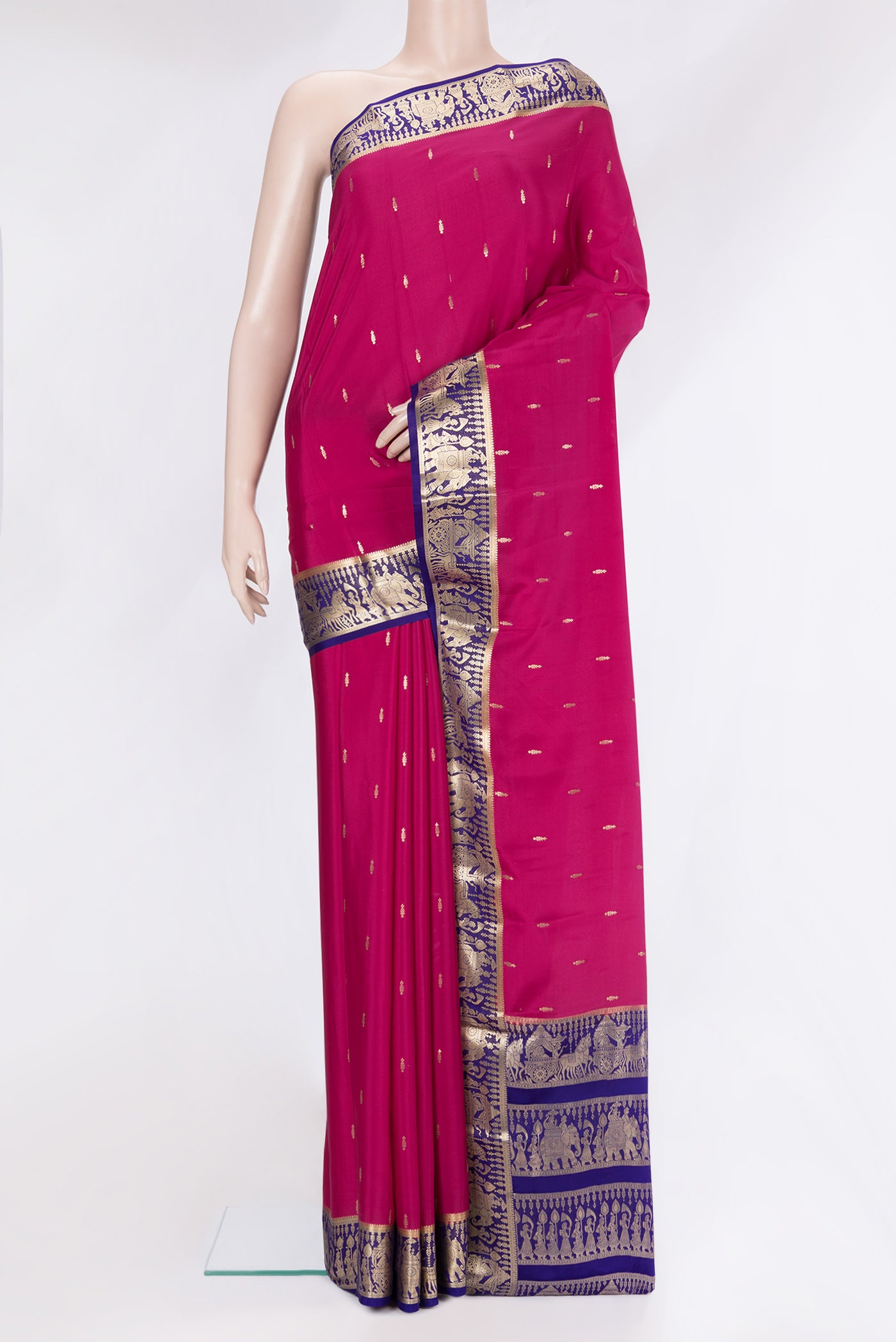 Dark Pink Mysore Silk Saree with Zari Butta on the body and Zari Border.  displayed on a mannequin