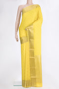 Lemon Yellow Mysore Crepe Saree with Zari Butta on the body and Zari Border.  displayed on a mannequin