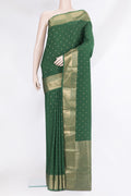 Bottle Green Mysore Silk Saree with Zari Butta on the body and Zari Border.  displayed on a mannequin