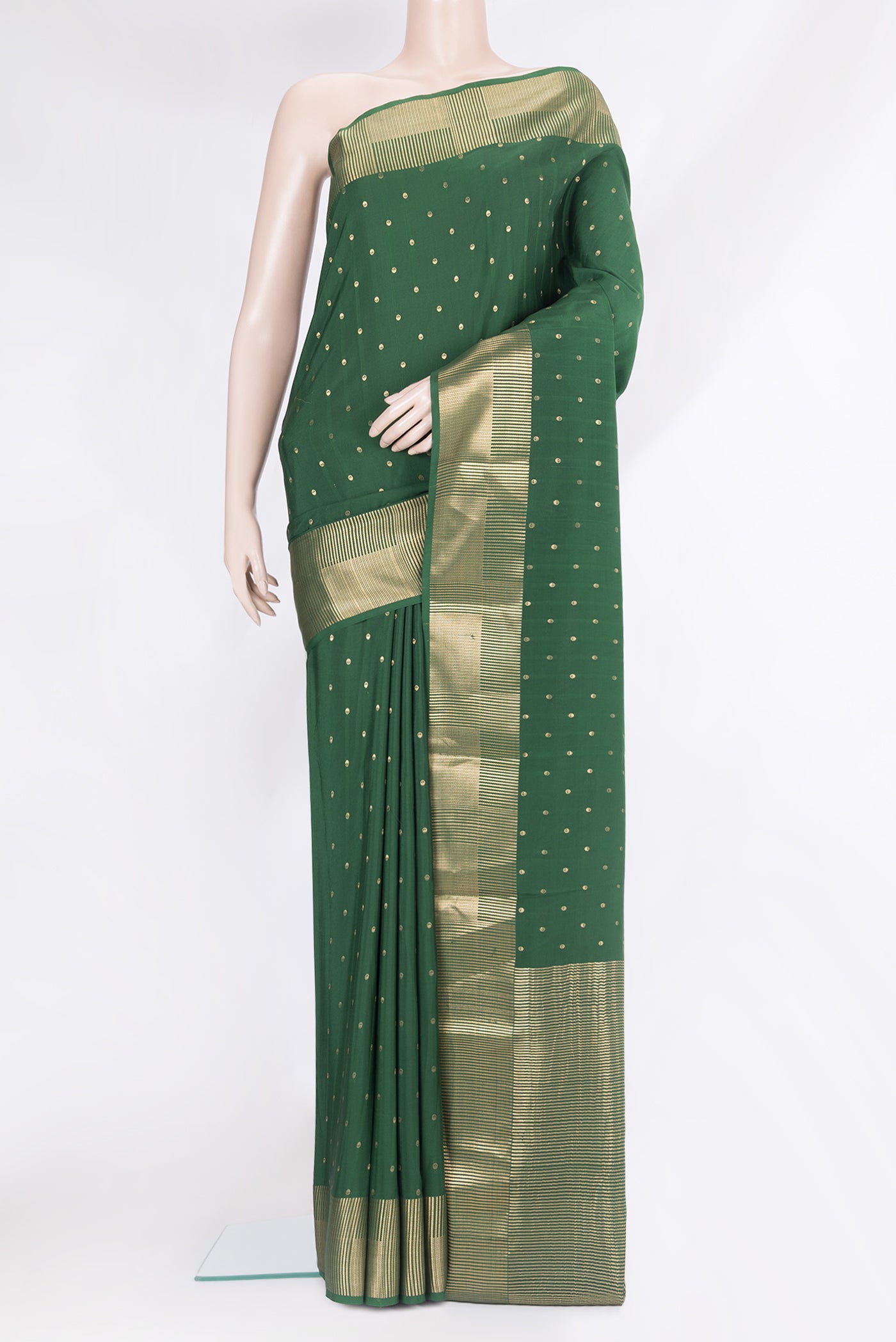 Bottle Green Mysore Silk Saree with Zari Butta on the body and Zari Border.  displayed on a mannequin
