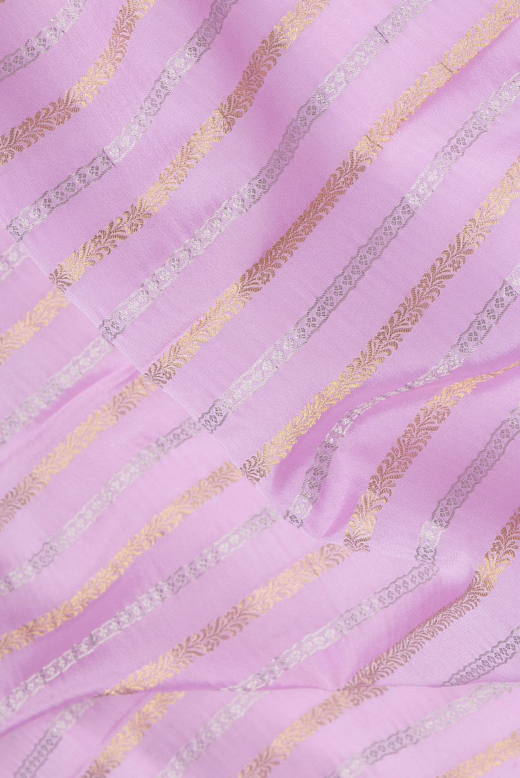 Close up of Pink Dual Tone Mysore Silk Saree with Stripes on the body and Zari Border.  displaying folds