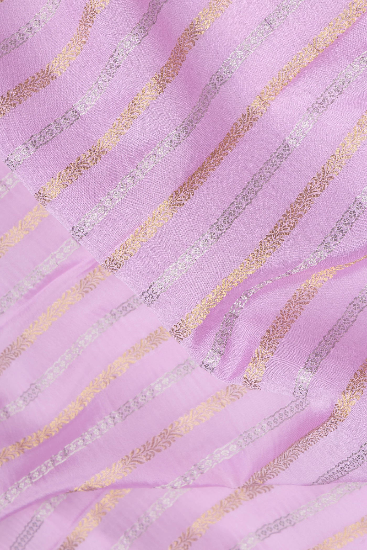 Close up of Pink Dual Tone Mysore Silk Saree with Stripes on the body and Zari Border.  displaying folds