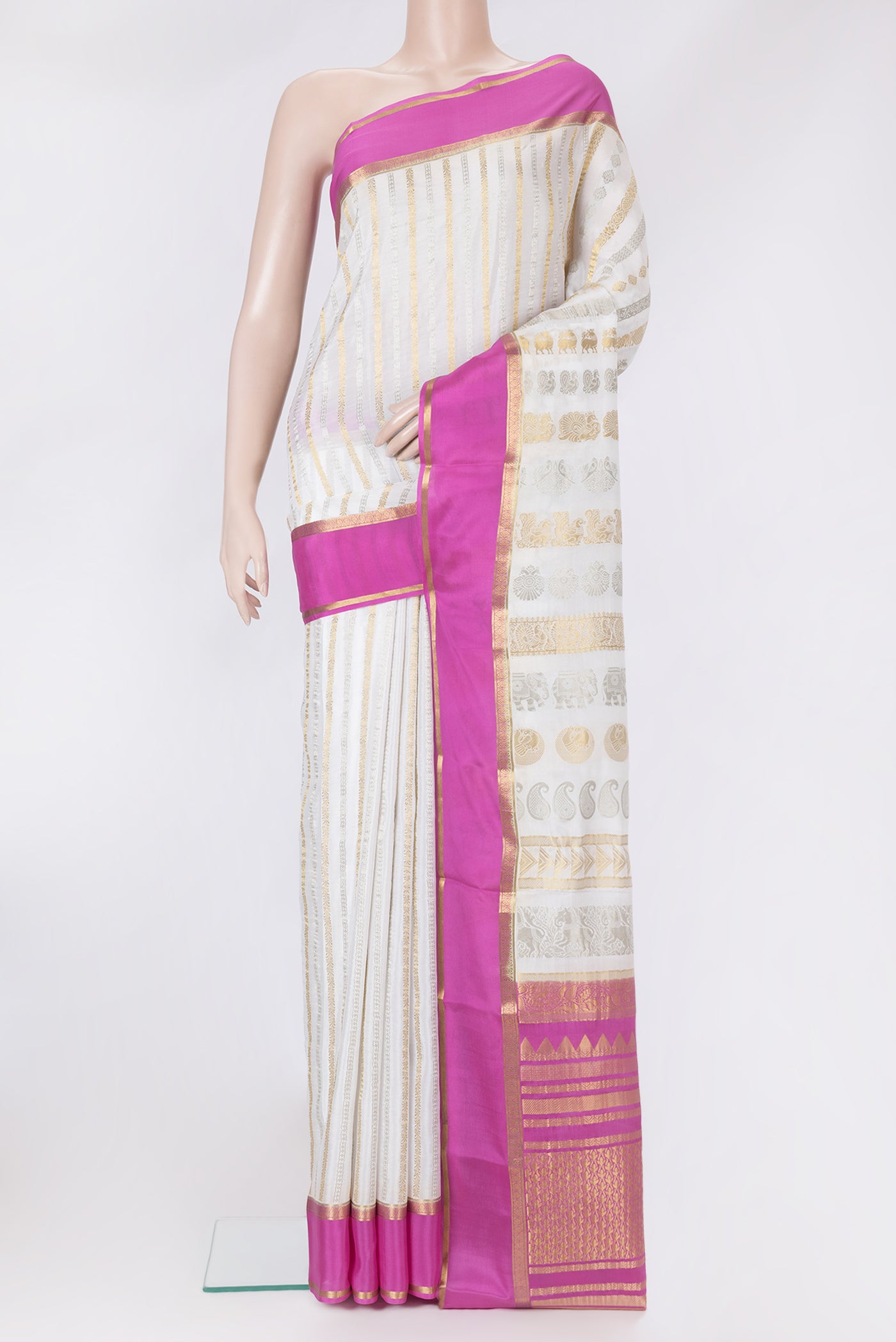 Off White Dual Tone Mysore Silk Saree with Stripes on the body and Zari Border.  displayed on a mannequin