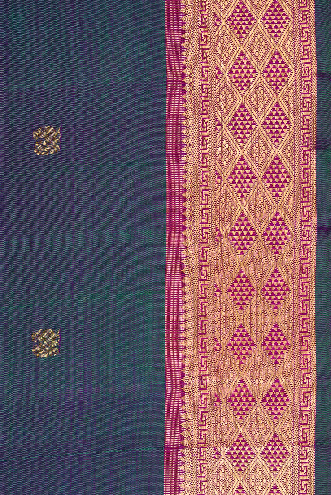 Border image of Peacock Blue Dual Tone Kanchipuram Silk Saree with Zari Butta on the body and Zari Border. 