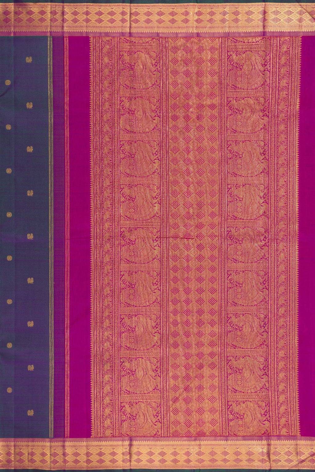 Close up image of the pallu of Peacock Blue Dual Tone Kanchipuram Silk Saree with Zari Butta on the body and Zari Border. 