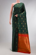 Pure Silk Pure Zari Bottle Green Dual Tone Kanjivaram Saree with Checked design on the body and Thin Zari Line.  displayed on a mannequin