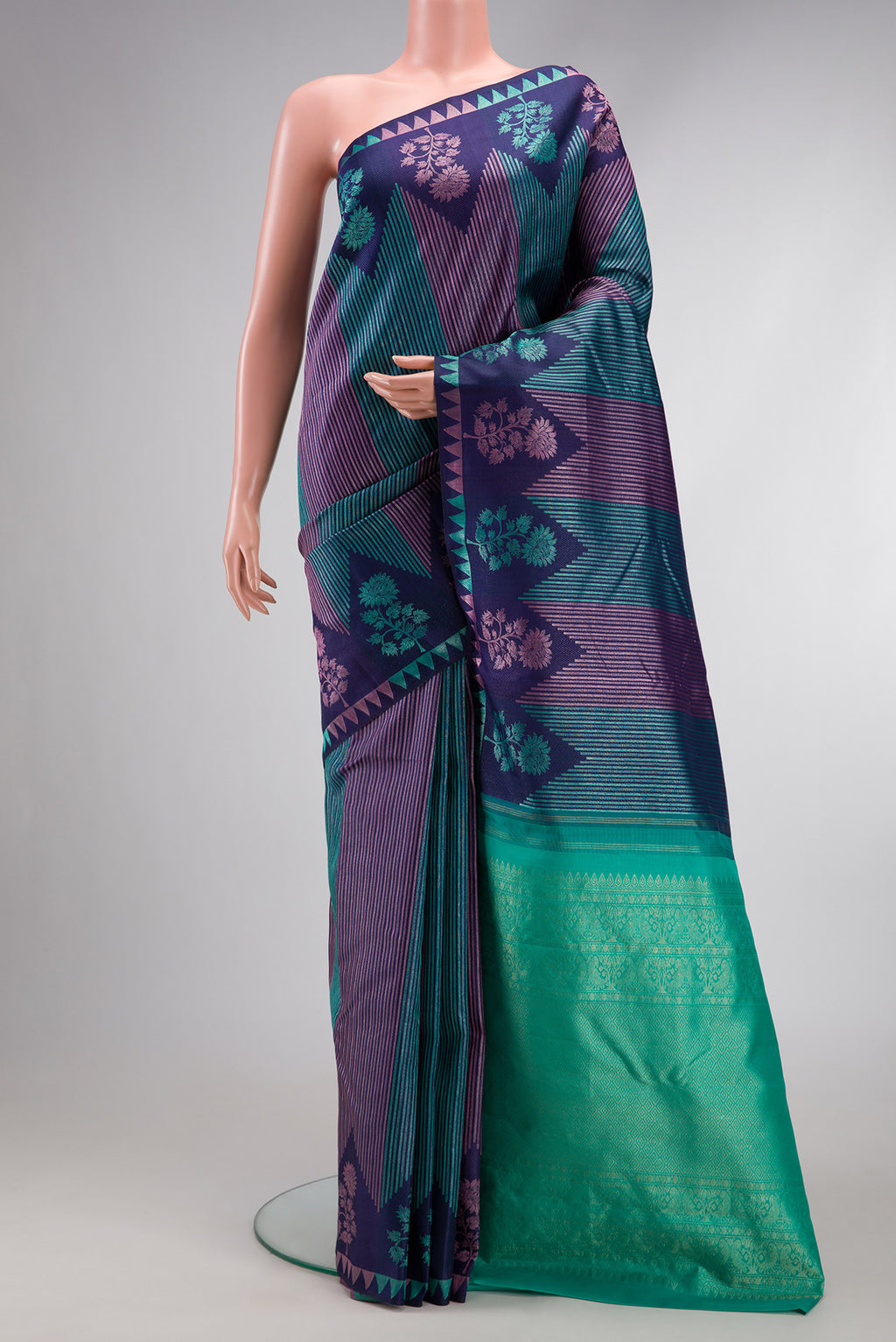 Pure Silk Pure Zari Navy Blue Dual Tone Kanjivaram Saree with Jacquard design on the body and Thread Border.  displayed on a mannequin