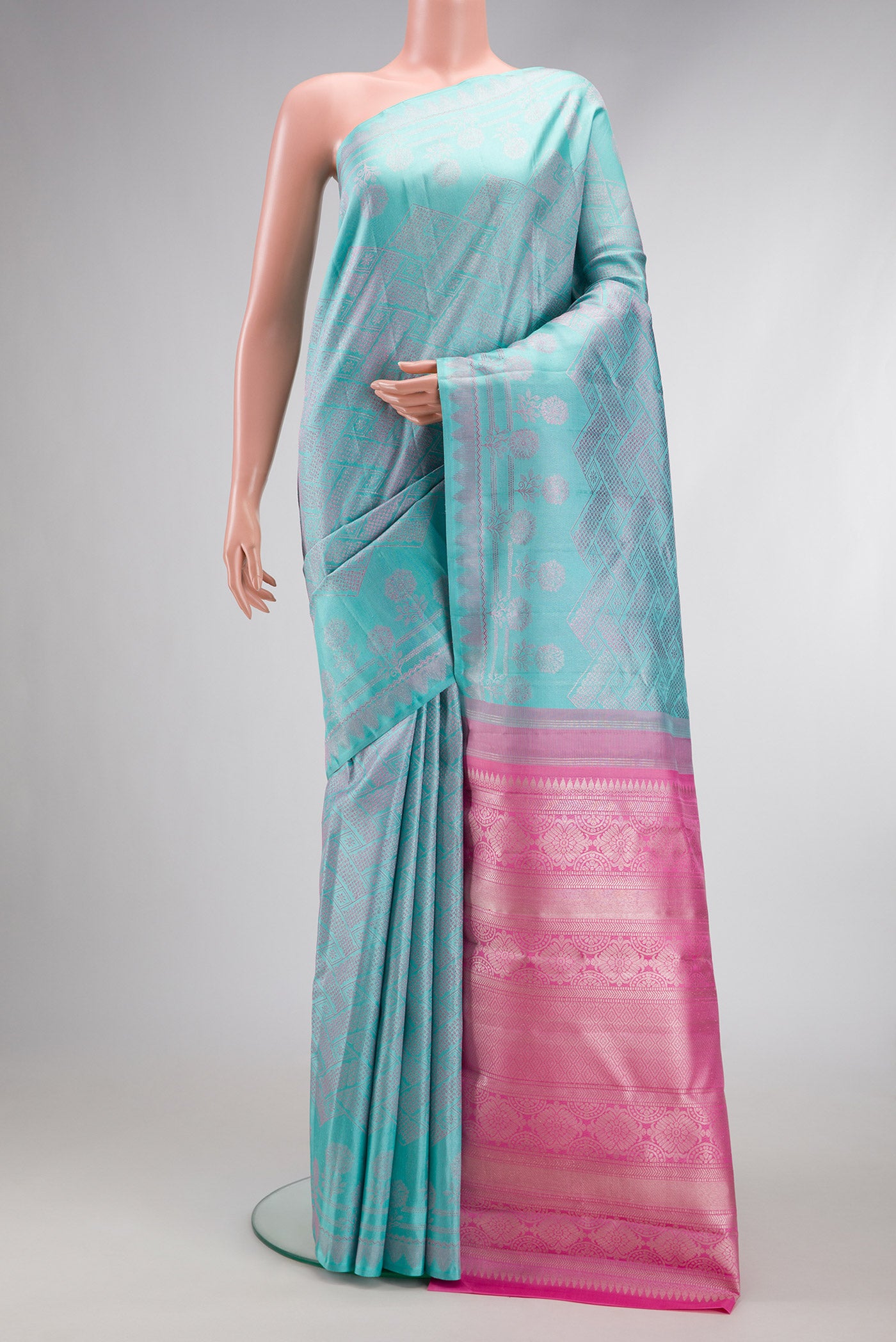 Light Blue Dual Tone Kanjivaram Silk Saree with Jacquard design on the body and Fancy Border.  displayed on a mannequin