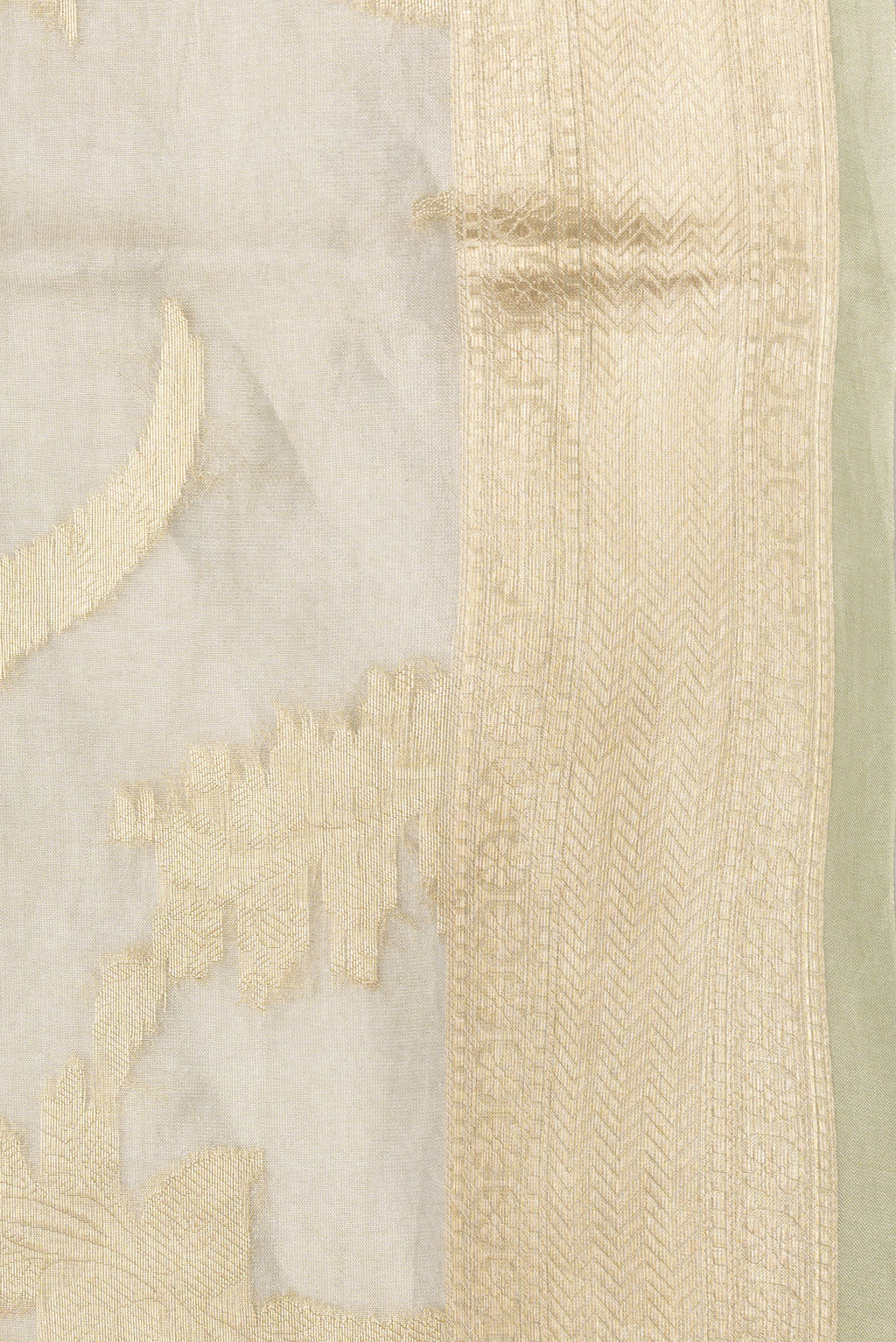 Border image of Pista Green Dual Tone Organza Silk Saree with Zari Brocade on the body and Zari Border. 