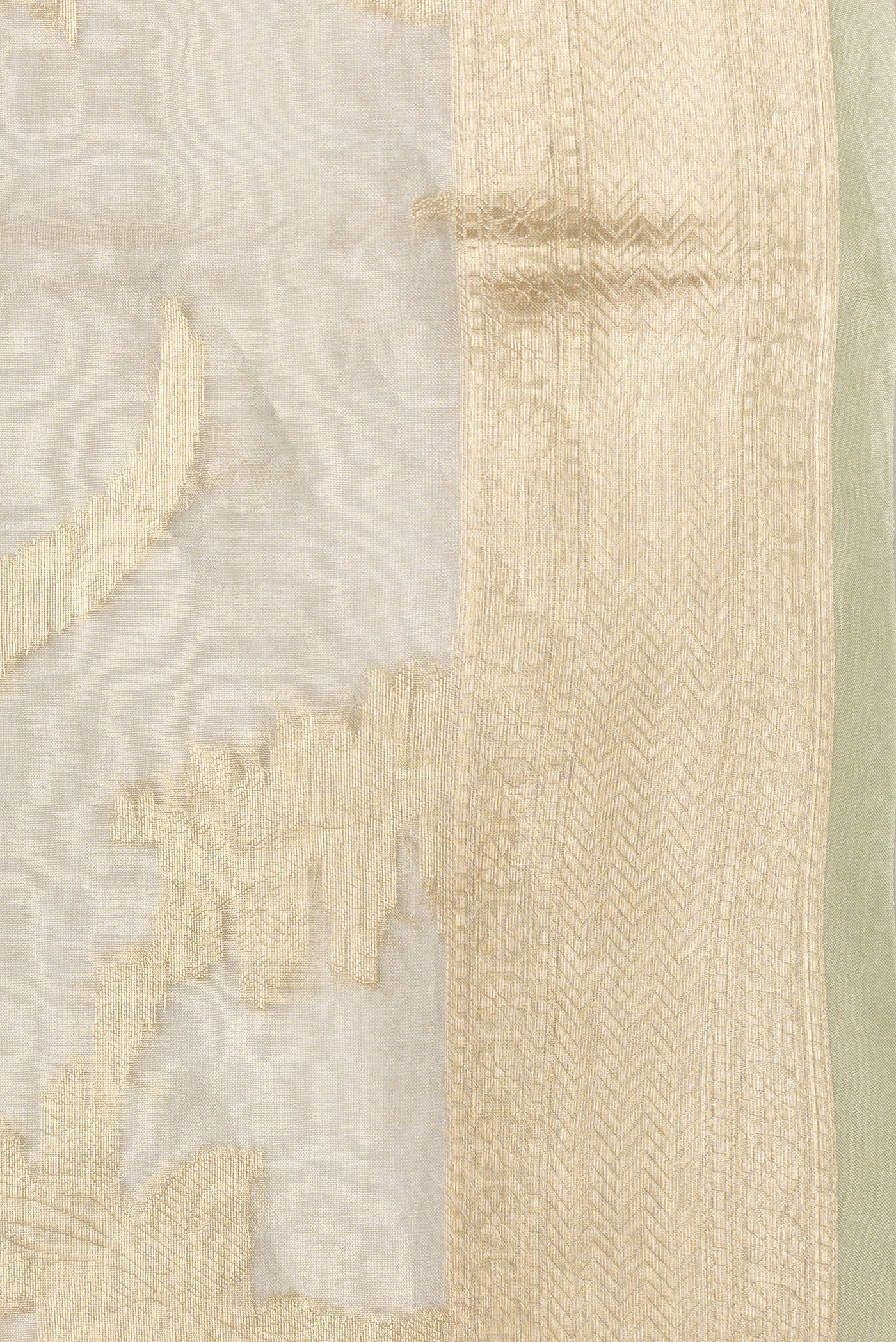 Border image of Pista Green Dual Tone Organza Silk Saree with Zari Brocade on the body and Zari Border. 