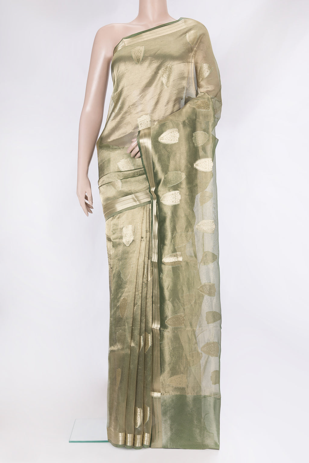 Green Dual Tone Organza Silk Saree with Zari Butta on the body and Zari Border.  displayed on a mannequin