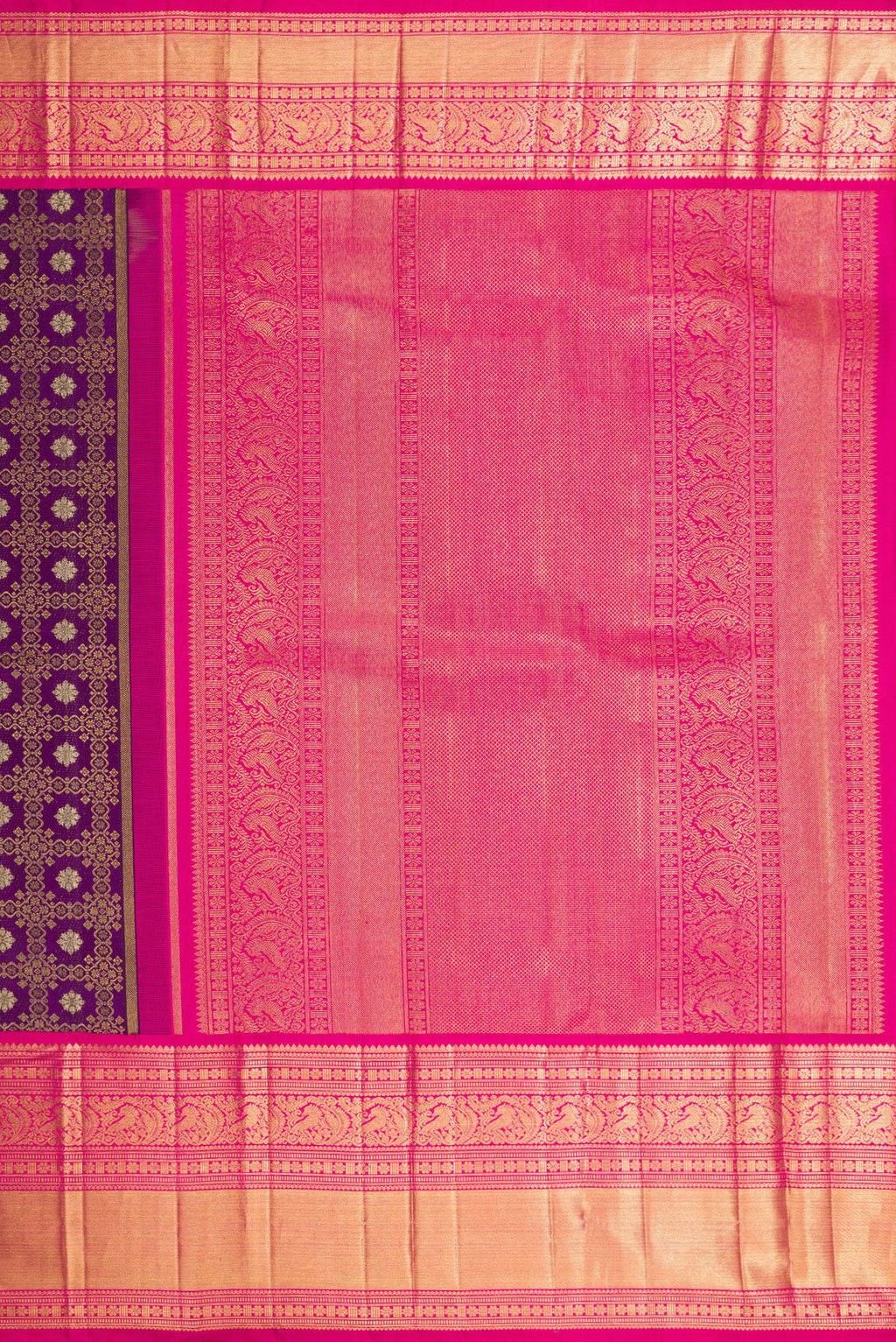 Close up image of the pallu of Purple Kanchipuram Silk Saree with Zari Brocade on the body and Zari Border. 