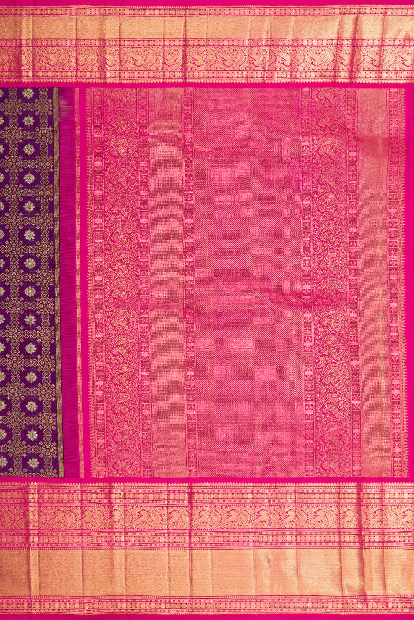 Close up image of the pallu of Purple Kanchipuram Silk Saree with Zari Brocade on the body and Zari Border. 