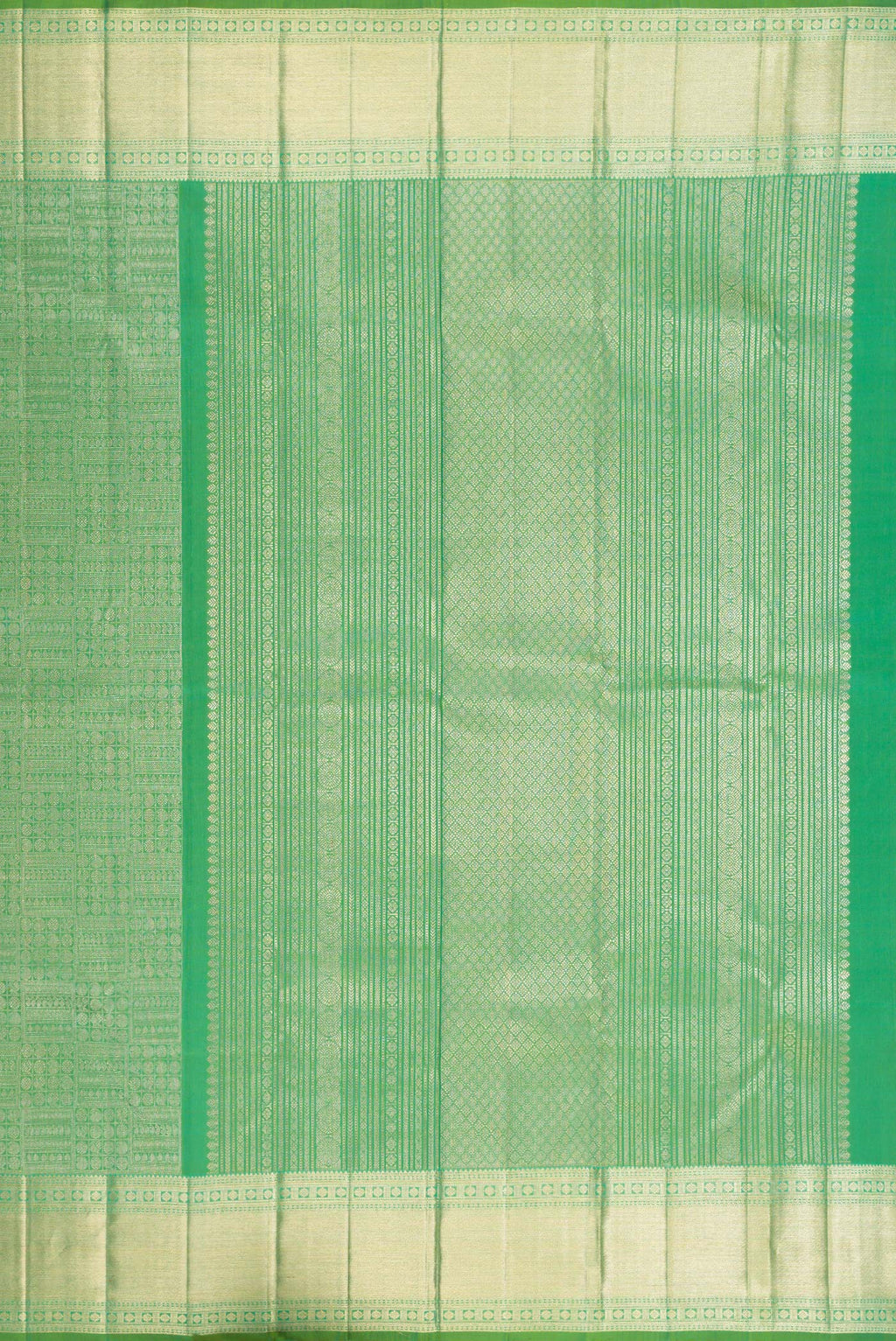 Close up image of the pallu of Green Kanchipuram Silk Saree with Zari Brocade on the body and Zari Border. 