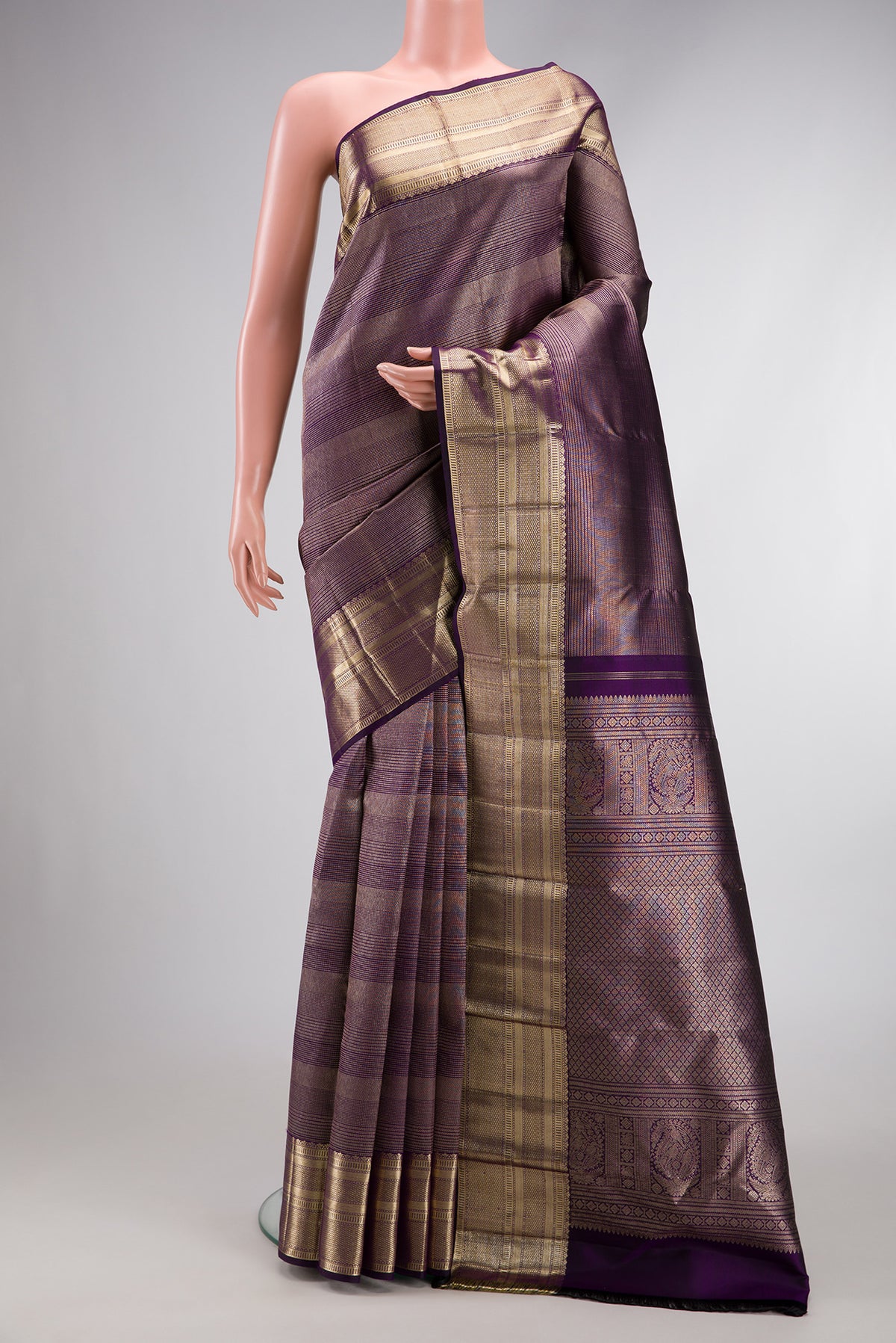 Violet Dual Tone Kanchipuram Silk Saree with Zari Brocade on the body and Zari Border.  displayed on a mannequin