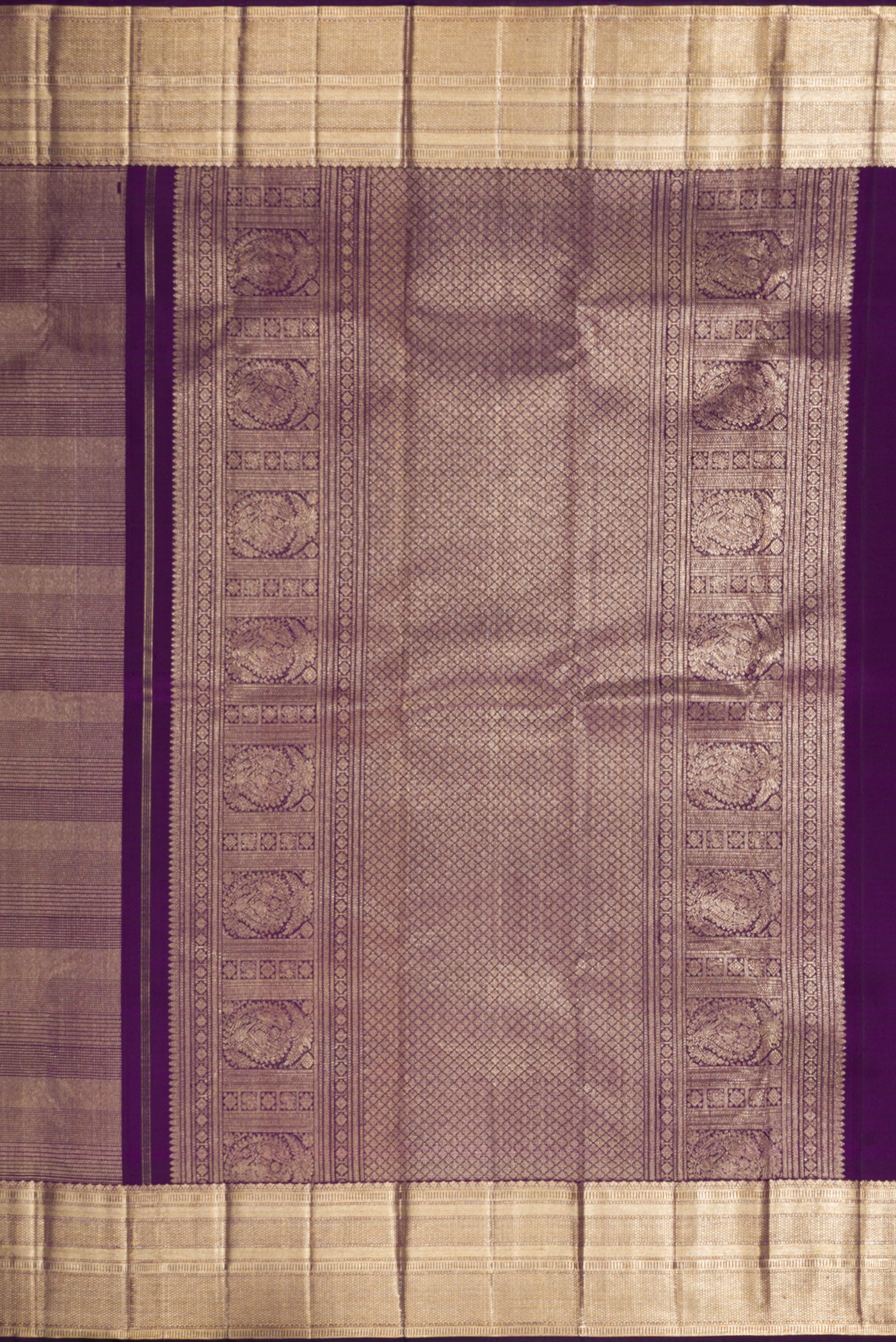 Close up image of the pallu of Violet Dual Tone Kanchipuram Silk Saree with Zari Brocade on the body and Zari Border. 