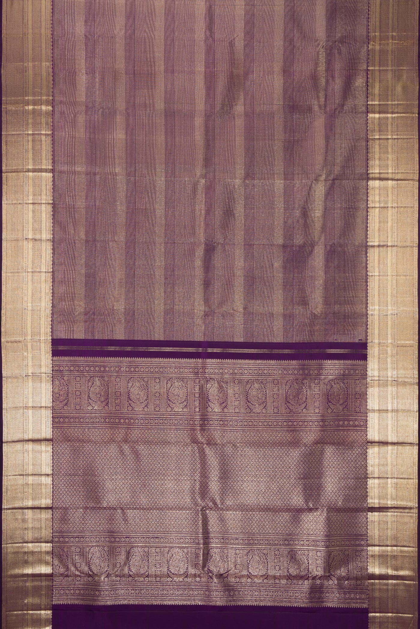 Flat view of Violet Dual Tone Kanchipuram Silk Saree with Zari Brocade on the body and Zari Border. 