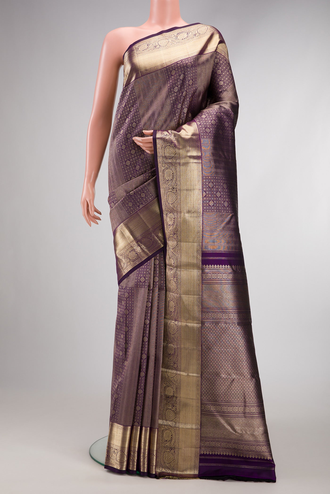 Violet Dual Tone Kanchipuram Silk Saree with Zari Brocade on the body and Zari Border.  displayed on a mannequin