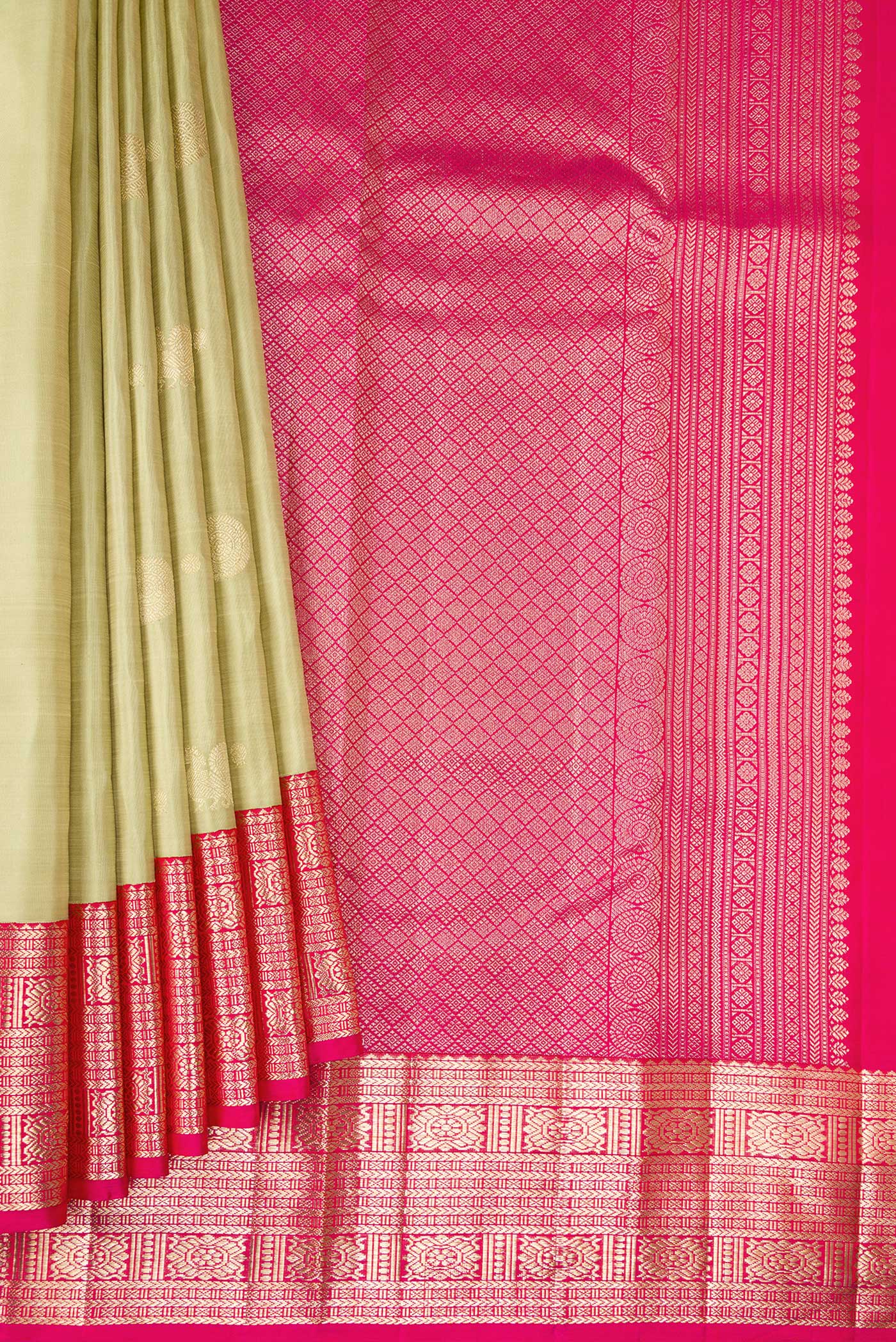 Pleats and pallu of Pista Green Dual Tone Kanchipuram Silk Saree with Zari Butta on the body and Zari Border. 