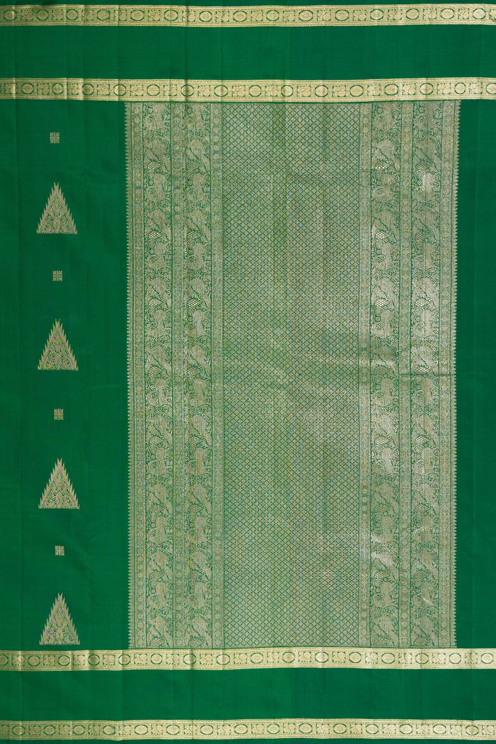 Close up image of the pallu of Bottle Green Kanjivaram Silk Saree with Zari Butta on the body and Zari Border. 