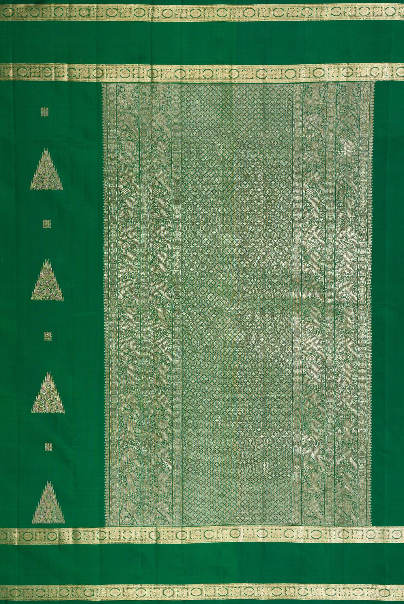Close up image of the pallu of Bottle Green Kanjivaram Silk Saree with Zari Butta on the body and Zari Border. 