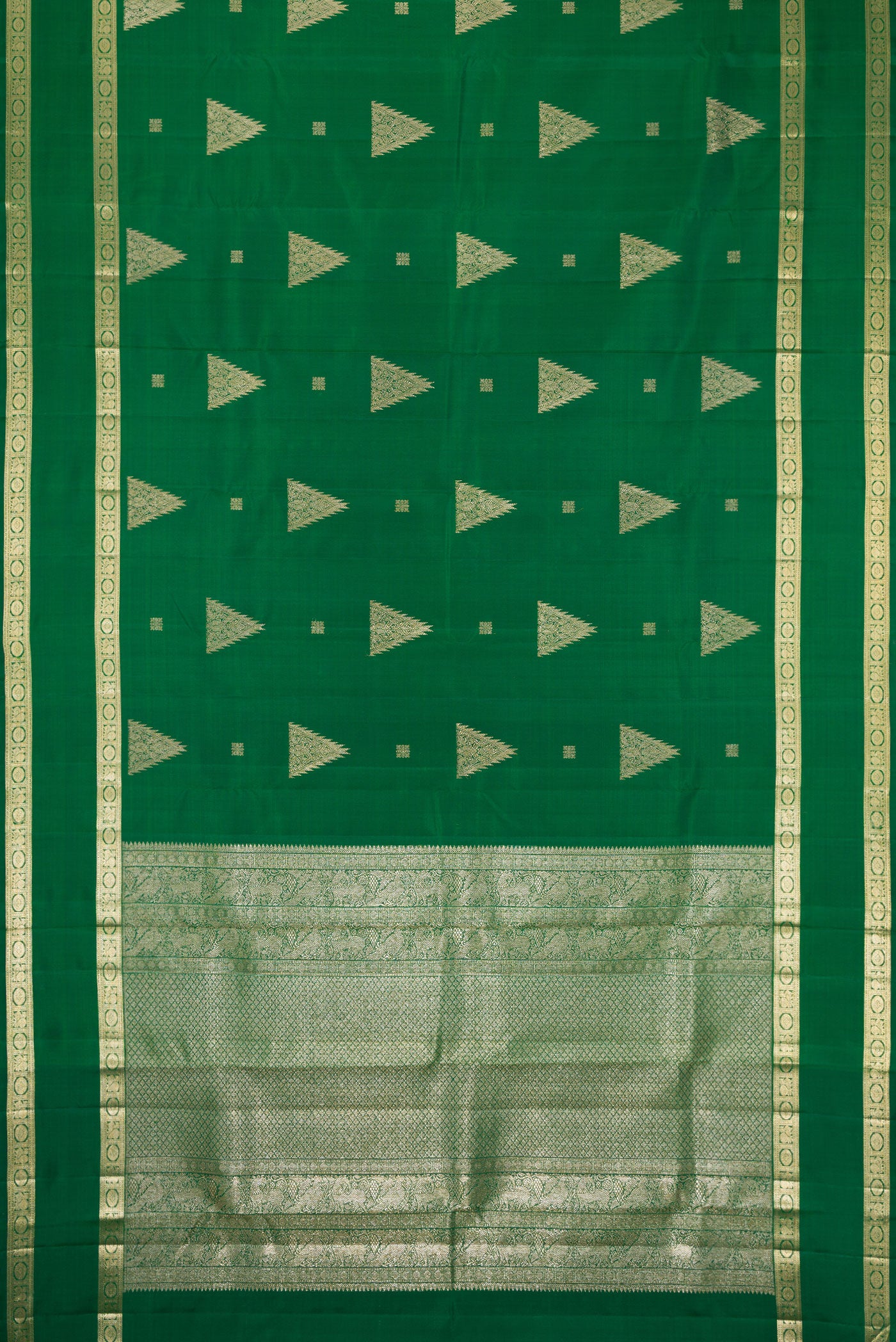 Flat view of Bottle Green Kanjivaram Silk Saree with Zari Butta on the body and Zari Border. 