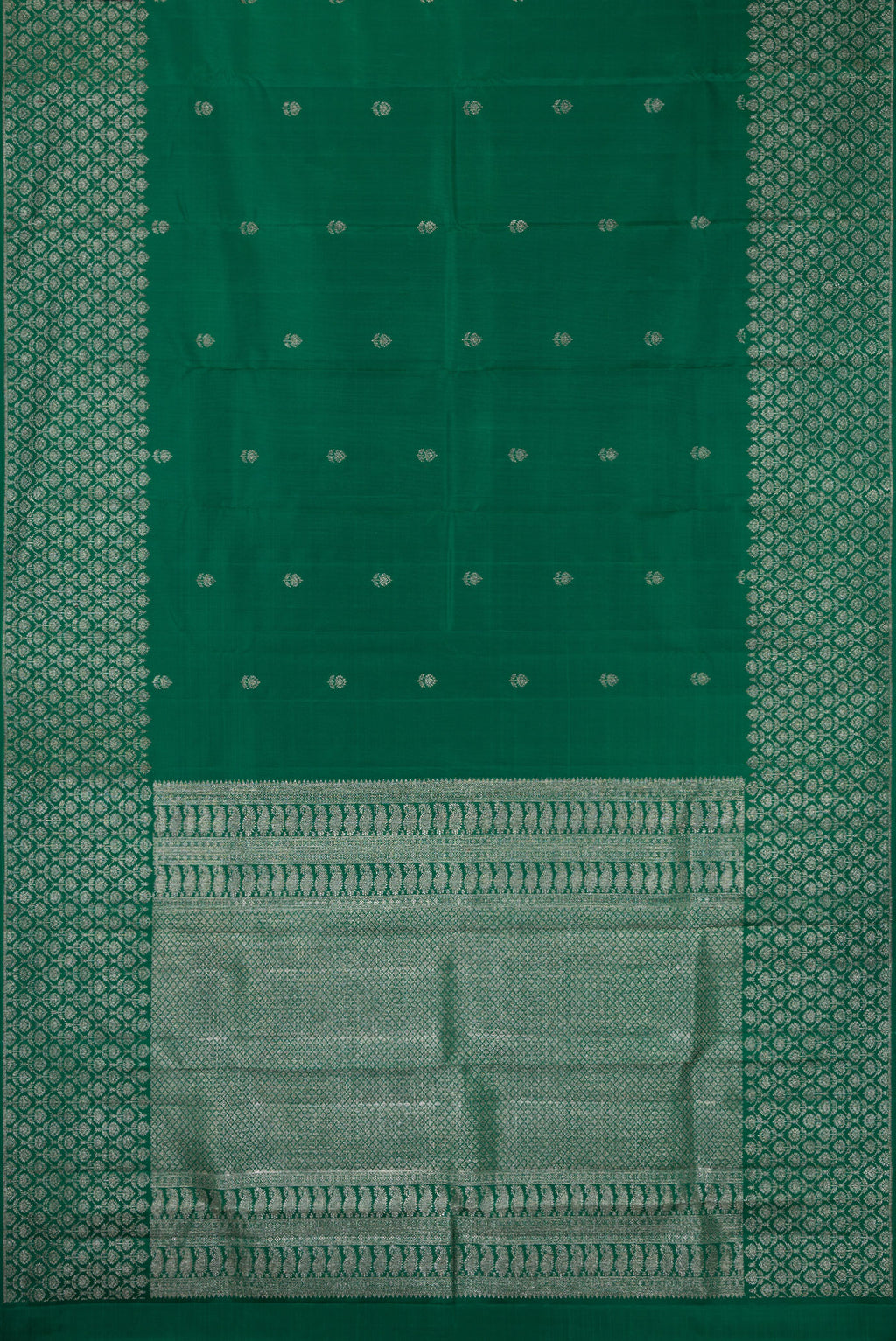 Flat view of Pure Silk Bottle Green Kanjivaram Saree with Zari Butta on the body and Fancy Border. 
