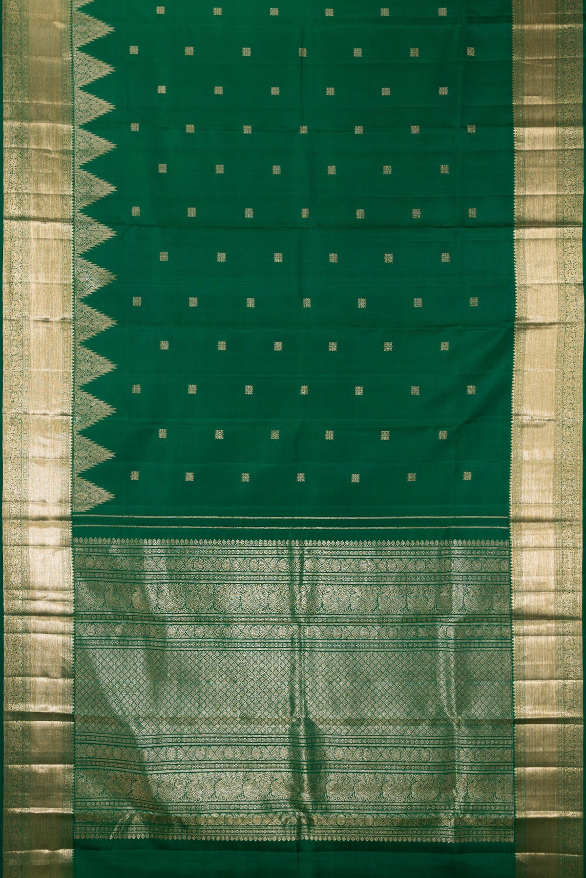 Flat view of Pure Silk Bottle Green Kanjivaram Saree with Zari Butta on the body and Zari Border. 